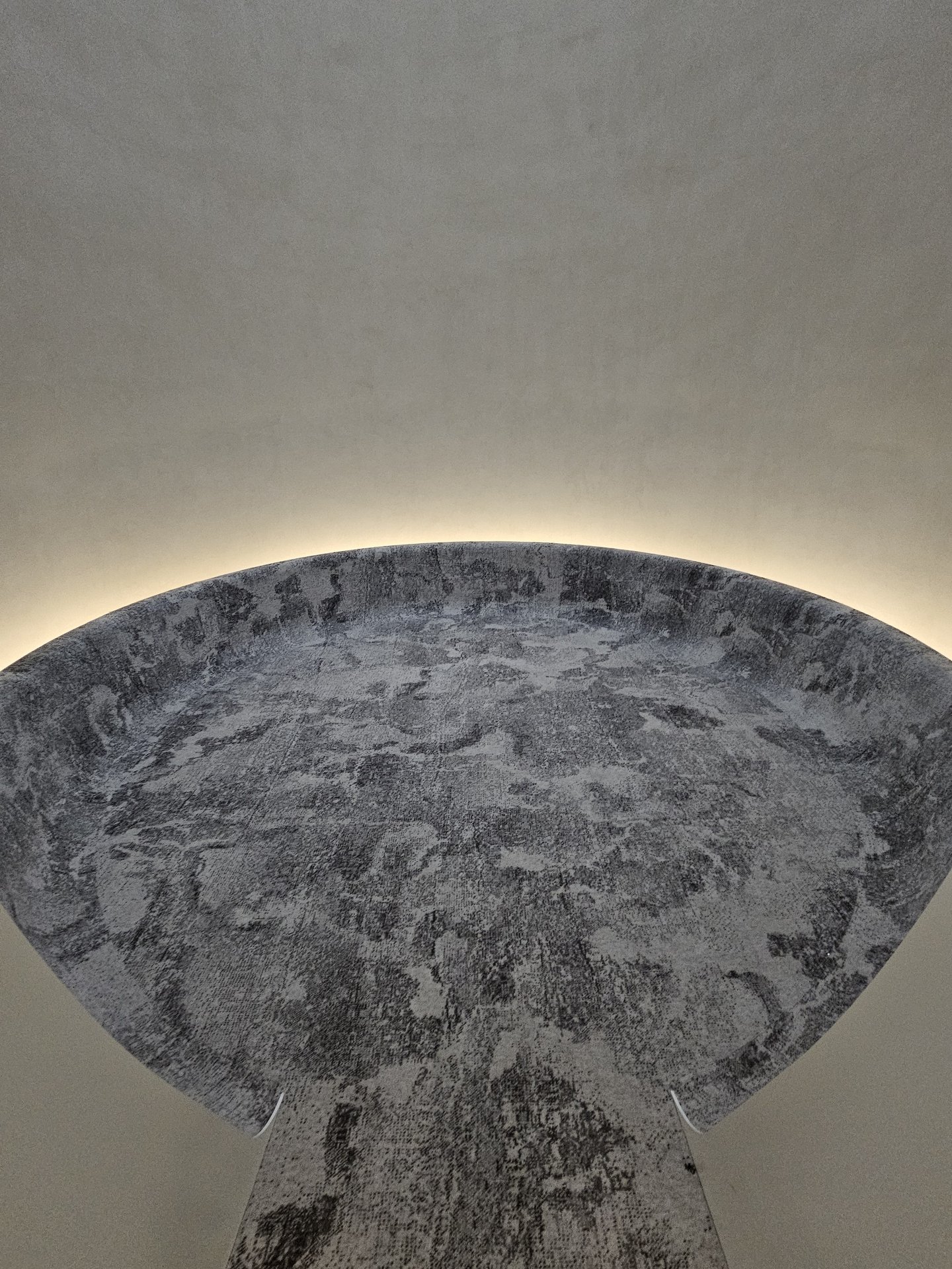 Meditation bench — finished installation, curved wall