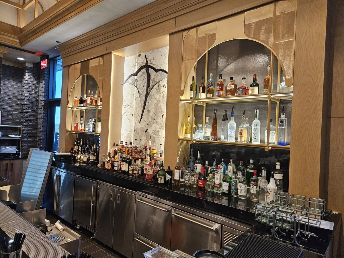 Ruth’s Chris host desk and entry stair